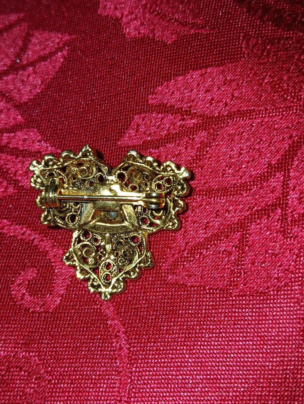 Vintage-Inspired Gold Filigree Brooch with Pearl and Green Accents